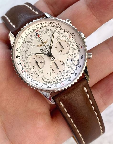 breitling navitimer world white dial brown leather bracelet|breitling navitimer models.